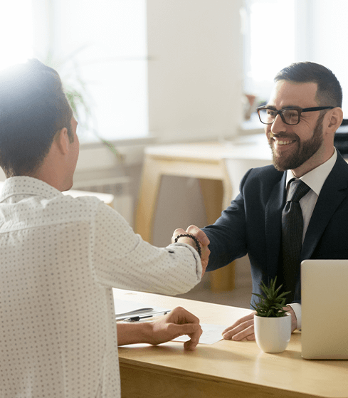 Young couple meeting with a businessman.